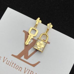 Louis Vuitton Lock And Key Asymmetric Earrings In Metal with Crystals Gold