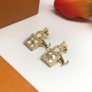 Louis Vuitton Lock Shape Earrings In Metal with Crystals Gold