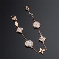 Louis Vuitton Color Blossom 5 Motifs Bracelet In Metal Gold/White